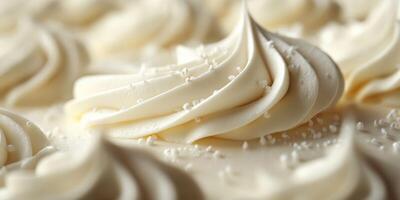 Creamy frosting swirls and decorations on a cake create an inviting and delightful dessert presentation photo
