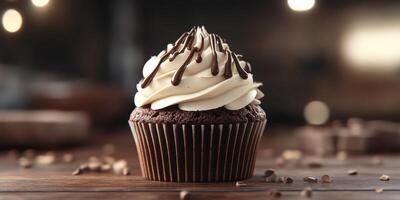 Chocolate cupcake with swirls of cream and chocolate drizzle on wooden table in cozy bakery photo