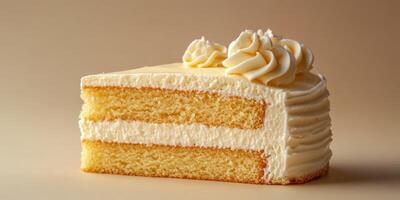 Delicious slice of vanilla cake with creamy frosting on a simple background photo