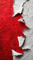 Textured paper revealing red and white layers in an artistic backdrop showcasing contrast and depth photo