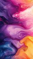 Vibrant abstract swirls of color create a mesmerizing visual display with bursts of purple, pink, and gold elements in a fluid design photo