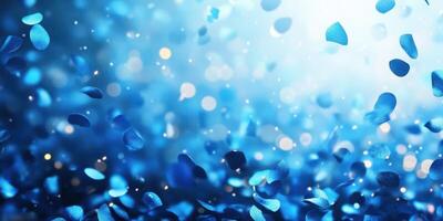 Sparkling blue confetti falls gracefully against a bright background creating a festive atmosphere for celebrations and events photo