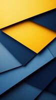 Colorful arrangement of layered paper in shades of blue and yellow displayed artistically on a flat surface photo