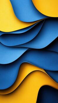 Vibrant waves of blue and yellow paper create a dynamic visual display with smooth curves and textures photo