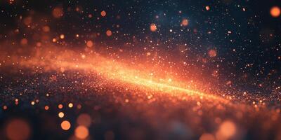 Sparkling orange particles create a mesmerizing glowing effect against a dark backdrop during a nighttime celebration photo
