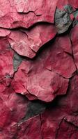 Unique texture of red and black layered rocks creates an abstract natural backdrop photo