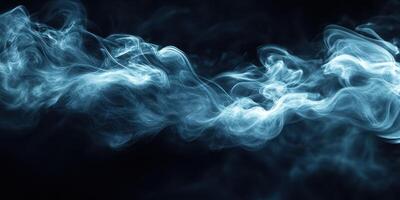 Mystical blue smoke swirling in darkness creates an ethereal atmosphere perfect for artistic backgrounds photo