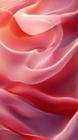 Soft pink and coral fabric drapes creating elegant folds and textures in natural light photo