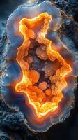 Stunning geode showcasing vibrant orange and blue patterns with shimmering crystal formations in a natural setting photo