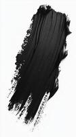Smooth black paint texture applied in sweeping strokes on a white background for artistic design photo