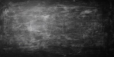 Blackboard surface with chalk marks ready for writing or drawing in a classroom or educational setting photo