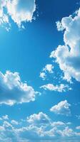 Bright blue sky filled with fluffy clouds during midday in a serene outdoor setting photo