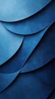 Colorful layers of blue paper create a dynamic texture in a creative art display showcasing depth and contrast photo