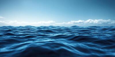 Waves gently rolling under a clear sky in the open sea during a tranquil afternoon photo