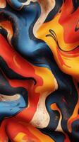 Colorful abstract fabric featuring swirling patterns in blue, red, yellow, and orange tones highlighting texture and design details photo