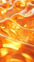 Vibrant orange translucent liquid waves flowing with smooth texture and glowing light in a bright setting photo