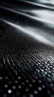 Abstract texture of a shiny metallic surface reflecting light in intricate patterns captured in a close-up view photo