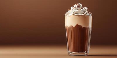 Delicious chocolate beverage topped with whipped cream and chocolate shavings in a glass photo