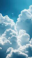 Vibrant clouds illuminated by sunlight creating a serene sky during midday photo