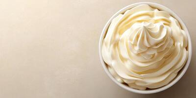 Delightful creamy swirl of soft serve ice cream in a cup ready to be enjoyed during a sunny afternoon photo