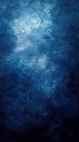 Deep blue abstract texture with a gradient effect showcasing a blend of light and shadows photo