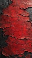 Textured wall featuring red and black peeling paint in an urban environment during daylight photo