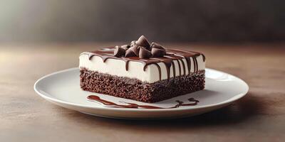 Decadent chocolate dessert on a plate showcasing layers of cake and whipped cream with chocolate drizzle photo