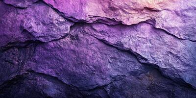 Textured rock surface displaying shades of purple and blue suitable for abstract background use in creative designs photo