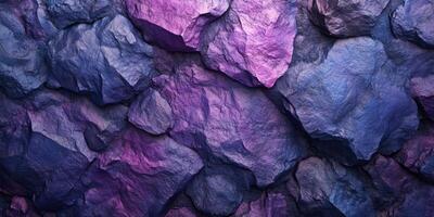 Colorful textured stones with purple and blue hues creating a vibrant backdrop for artistic designs photo