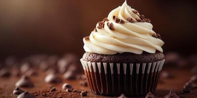 Delicious chocolate cupcake with creamy frosting and chocolate shavings on a wooden surface, perfect for dessert lovers photo