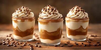 Delicious dessert cups with layers of cream, chocolate, and coffee placed on a rustic wooden table photo
