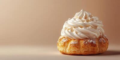 Cream-filled pastry placed on a neutral background during a culinary presentation or dessert display photo