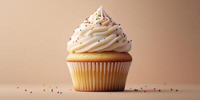 Delicious vanilla cupcake topped with creamy frosting and colorful sprinkles on a neutral background photo