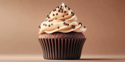 Delicious chocolate cupcake with creamy frosting and sprinkles on a smooth background photo