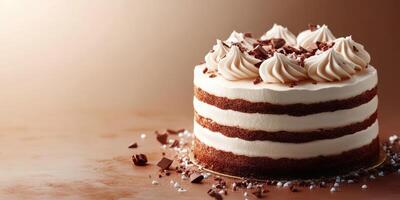 Delicious chocolate cake decorated with cream and chocolate shavings on a smooth surface photo
