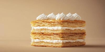 Delicious layers of pastry and cream create a stunning dessert presentation at a bakery in the afternoon light photo