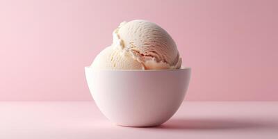 Creamy vanilla ice cream scoops in a white bowl on a pastel pink background photo