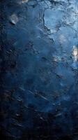 Textured dark blue wall with subtle highlights creating an atmospheric background effect photo