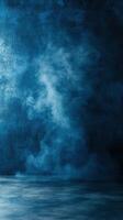 Blue smoke creates a mysterious atmosphere in a dimly lit space photo