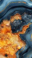 Abstract art inspired by natural landscapes featuring blue, orange, and gold textures created through artistic techniques photo