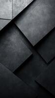 Textured dark surfaces with geometric shapes create a modern, minimalist design in an abstract composition photo