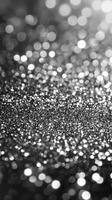 Sparkling silver glitter fills the surface creating a magical and festive atmosphere during a celebration photo