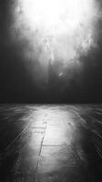 Dark textured floor with illuminated wall reflecting soft light creating an abstract atmosphere in a minimalistic space photo