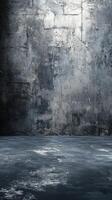 Wall and floor textures in a dimly lit industrial space create a stark, moody atmosphere for photography and artistic projects photo