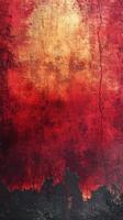 Vibrant textured wall exhibiting warm red and gold hues with contrasting dark edges, creating an artistic backdrop photo
