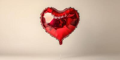 Heart-shaped balloon in vibrant red color floating against a neutral background photo