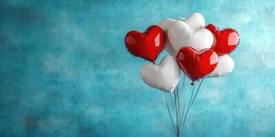 Heart-shaped balloons in red and white float against a textured blue background, perfect for celebrations or romantic occasions photo