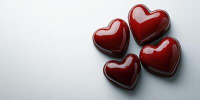 Chocolate hearts arranged in a decorative pattern on a clean surface perfect for romantic occasions photo