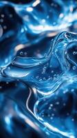 Swirling blue liquid with bubbles showcases the beauty of water movement and light reflections photo
