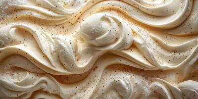 Creamy dessert topping with swirls and specks in a close-up display showcasing texture and richness photo